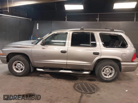 2000 Dodge Durango with VIN 1B4HS28N0YF279416, listed as a IAAI auction lot 41767387 with 157,649 mi miles and . Bid and sale history available at DreamBid. Image 14.