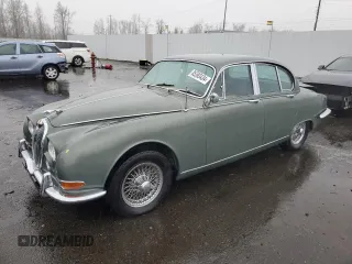 1965 Jaguar S-Type with VIN P1B76828BW, listed as a Copart auction lot 85593434 with 1,886 mi miles and Clean Title. Bid and sale history available at DreamBid. Image 1.