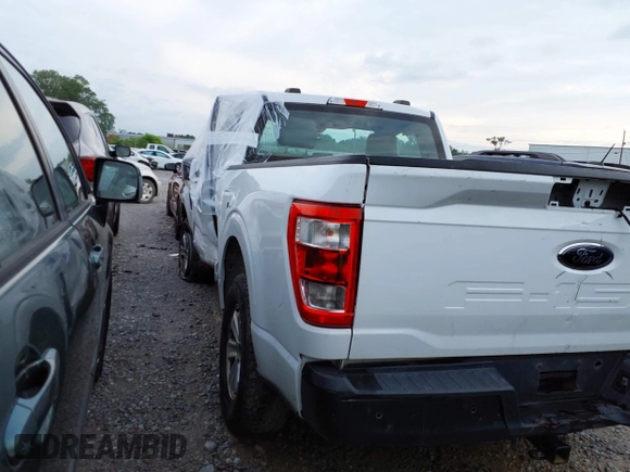 2021 Ford F-150 XL with VIN 1FTMF1CB5MKE25341, listed as a IAAI auction lot 42103478 with 125,369 mi miles and . Bid and sale history available at DreamBid. Image 3.