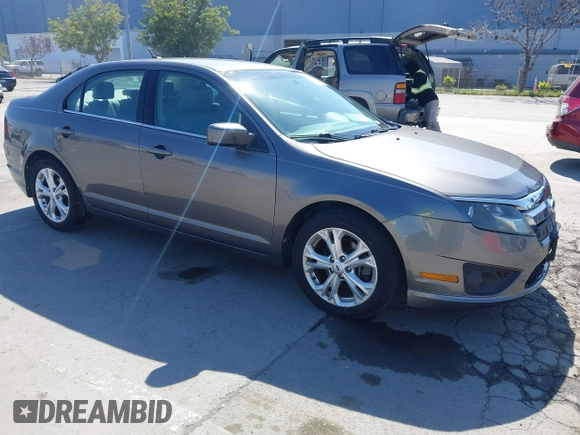 2012 Ford Fusion SE z VIN 3FAHP0HA8CR401382, wystawiony jako IAAI lot #41739680 z przebiegiem 73 404 mil mil oraz . Historia ofert i sprzedaży dostępna na DreamBid. Obrazek 1.