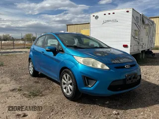 2013 Ford Fiesta SE with VIN 3FADP4EJ0DM141097, listed as a Copart auction lot 51342175 with 146,316 mi miles and Clean Title. Bid and sale history available at carsss.com. Image 1.