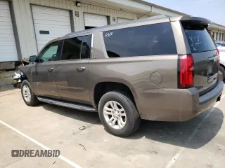 2015 Chevrolet Suburban LS with VIN 1GNSCHKC8FR628406, listed as a Copart auction lot 60682805 with 195,151 mi miles and Salvage title. Bid and sale history available at DreamBid. Image 2.