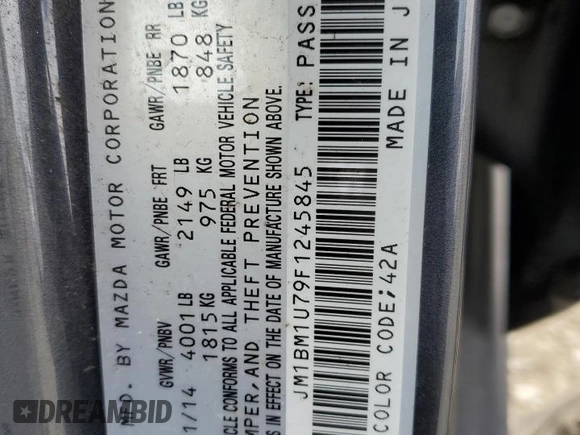 2015 Mazda 3 i Sport with VIN JM1BM1U79F1245845, listed as a Copart auction lot 52589195 with 90,216 mi miles and Salvage Title. Bid and sale history available at DreamBid. Image 12.