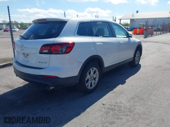 2015 Mazda CX-9 Sport with VIN JM3TB2BV3F0455632, listed as a IAAI auction lot 41881026 with 102,201 mi miles and . Bid and sale history available at carsss.com. Image 4.