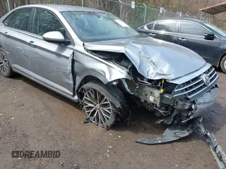 2021 Volkswagen Jetta S z VIN 3VWC57BUXMM048600, wystawiony jako IAAI lot #41956222 z przebiegiem 59 870 mil mil oraz . Historia ofert i sprzedaży dostępna na DreamBid. Obrazek 6.