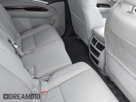 2015 Acura MDX Tech Pkg with VIN 5FRYD4H47FB002889, listed as a IAAI auction lot 41668025 with 96,781 mi miles. Bid and sale history available at carsss.com. Image 8.