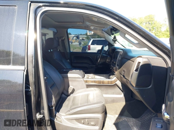 2015 GMC Sierra 1500 Denali with VIN 3GTU2WEJ6FG400004, listed as a IAAI auction lot 42097356 with 148,544 mi miles and . Bid and sale history available at DreamBid. Image 5.