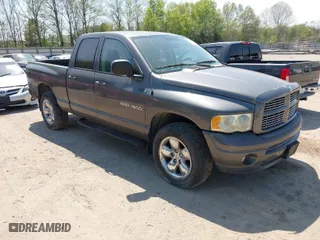 2003 Dodge Ram 1500 ST with VIN 1D7HU18N13S266025, listed as a IAAI auction lot 42040676 with 211,673 mi miles. Bid and sale history available at carsss.com. Image 1.