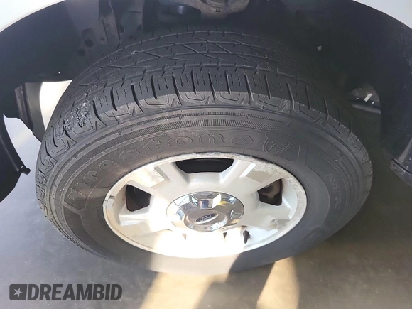 2014 Ford F-150 XL with VIN 1FTMF1CF7EKF40446, listed as a IAAI auction lot 42785365 with 186,000 mi miles and . Bid and sale history available at DreamBid. Image 1.