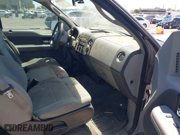 2007 Ford F-150 STX with VIN 1FTRX12W27FB43971, listed as a IAAI auction lot 42668899 with 142,834 mi miles and . Bid and sale history available at DreamBid. Image 5.