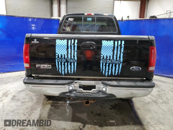 1999 Ford F-250 XL with VIN 1FTNX21SXXEE02893, listed as a Copart auction lot 75717534 with 127,574 mi miles and Clean title. Bid and sale history available at DreamBid. Image 6.