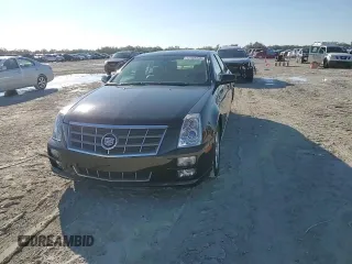 2009 Cadillac STS AWD z VIN 1G6DD67V690120833, wystawiony jako Copart lot #42502345 z przebiegiem 100 250 mil mil oraz Szkoda całkowita • Salvage title. Historia ofert i sprzedaży dostępna na DreamBid. Obrazek 10.