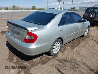 2003 Toyota Camry LE with VIN 4T1BE30K63U769219, listed as a IAAI auction lot 42178777 with 293,769 mi miles and . Bid and sale history available at DreamBid. Image 4.