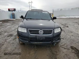 2004 Volkswagen Touareg z VIN WVGBC77LX4D062055, wystawiony jako Copart lot #45960445 z przebiegiem 201 819 mil mil oraz Szkoda całkowita • Salvage title. Historia ofert i sprzedaży dostępna na DreamBid. Obrazek 5.