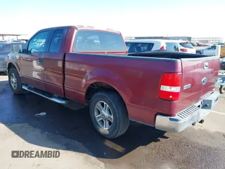 2005 Ford F-150 XLT with VIN 1FTPX12565NA45477, listed as a IAAI auction lot 41448417 with 145,039 mi miles. Bid and sale history available at carsss.com. Image 3.