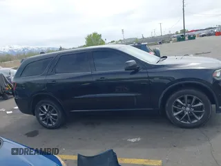 2015 Dodge Durango SXT with VIN 1C4RDJAGXFC796034, listed as a IAAI auction lot 42057983 with 159,108 mi miles and . Bid and sale history available at DreamBid. Image 13.