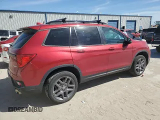 2023 Honda Passport EX-L with VIN 5FNYF8H57PB007264, listed as a Copart auction lot 48942955 with 18,013 mi miles and Salvage Title. Bid and sale history available at DreamBid. Image 3.