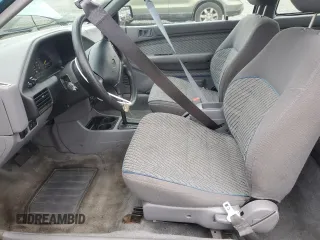 1995 Ford Escort z VIN 1FASP1284SW307142, wystawiony jako Copart lot #88531955 z przebiegiem 93 323 mil mil oraz Szkoda całkowita • Salvage title. Historia ofert i sprzedaży dostępna na DreamBid. Obrazek 7.