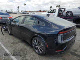2023 Toyota Prius LE z VIN JTDACAAUXP3005928, wystawiony jako Copart lot #56358905 z przebiegiem 38 417 mil mil oraz Szkoda całkowita • Salvage title. Historia ofert i sprzedaży dostępna na DreamBid. Obrazek 2.