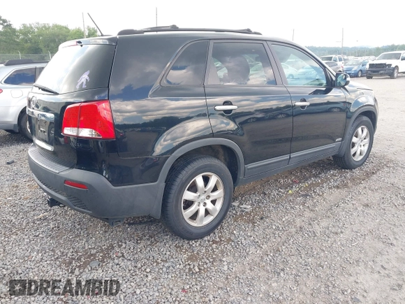 2013 Kia Sorento LX with VIN 5XYKTDA68DG408823, listed as a IAAI auction lot 42554361 with 221,917 mi miles and . Bid and sale history available at DreamBid. Image 4.