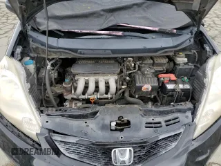 2010 Honda Fit Sport with VIN JHMGE8H49AC039500, listed as a Copart auction lot 53576655 with 170,571 mi miles and Salvage Title. Bid and sale history available at carsss.com. Image 12.
