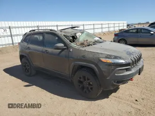2016 Jeep Cherokee Trailhawk z VIN 1C4PJMBB5GW366190, wystawiony jako Copart lot #67792724 z przebiegiem 103 924 mil mil oraz Szkoda całkowita • Salvage title. Historia ofert i sprzedaży dostępna na DreamBid. Obrazek 4.