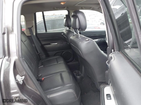 2015 Jeep Compass Latitude with VIN 1C4NJDEB9FD105996, listed as a IAAI auction lot 41729501 with 147,954 mi miles. Bid and sale history available at carsss.com. Image 8.