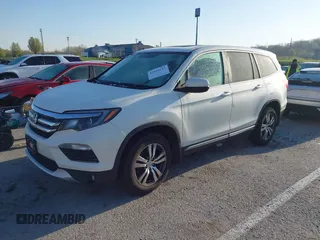 2017 Honda Pilot EX-L with VIN 5FNYF6H54HB015814, listed as a IAAI auction lot 41955743 with 122,389 mi miles and . Bid and sale history available at DreamBid. Image 17.