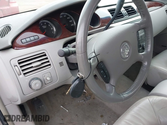 2010 Buick Lucerne CXL with VIN 1G4HC5EM8AU111422, listed as a IAAI auction lot 41485341 with 57,334 mi miles and . Bid and sale history available at DreamBid. Image 11.