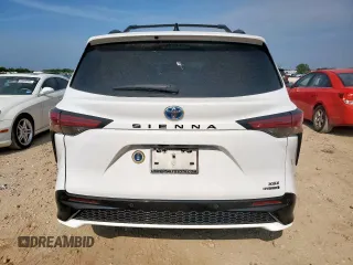 2021 Toyota Sienna XSE with VIN 5TDDRKECXMS011869, listed as a Copart auction lot 60333135 with 77,316 mi miles and Salvage title. Bid and sale history available at DreamBid. Image 6.