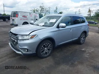 2017 Mitsubishi Outlander SE with VIN JA4AD3A31HZ050863, listed as a IAAI auction lot 42528872 with 98,136 mi miles and . Bid and sale history available at DreamBid. Image 2.