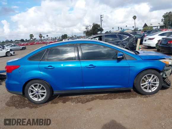 2016 Ford Focus SE with VIN 1FADP3F22GL282910, listed as a IAAI auction lot 42075913 with 149,776 mi miles. Bid and sale history available at carsss.com. Image 13.