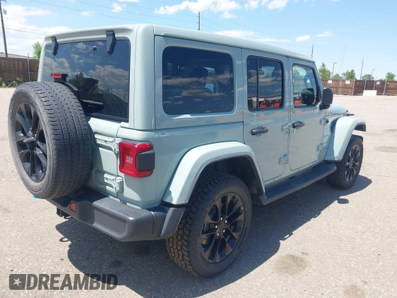 2023 Jeep Wrangler Sahara with VIN 1C4JJXP68PW627007, listed as a IAAI auction lot 42474745 with 57,912 mi miles and . Bid and sale history available at DreamBid. Image 4.