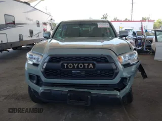 2022 Toyota Tacoma SR with VIN 3TMCZ5ANXNM479025, listed as a IAAI auction lot 42280363 with 29,650 mi miles and . Bid and sale history available at DreamBid. Image 12.