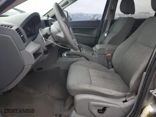 2007 Jeep Grand Cherokee Laredo with VIN 1J8GR48KX7C674935, listed as a Copart auction lot 87289004 with 159,366 mi miles and Clean Title. Bid and sale history available at carsss.com. Image 7.