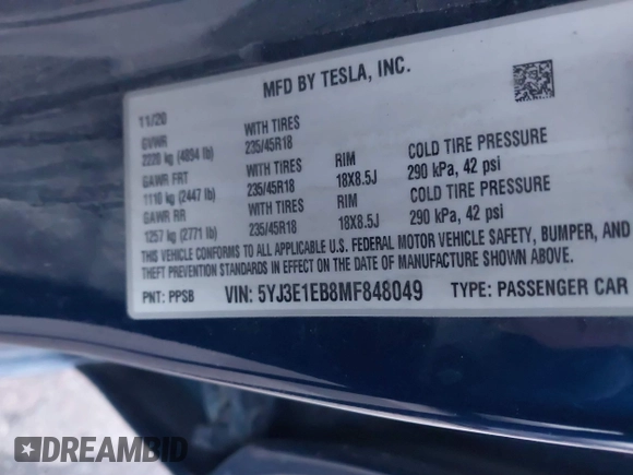 2021 Tesla Model 3 Long Range with VIN 5YJ3E1EB8MF848049, listed as a IAAI auction lot 40974331 with 61,462 mi miles. Bid and sale history available at carsss.com. Image 9.
