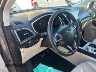 2021 Ford Edge Titanium with VIN 2FMPK3K96MBA51234, listed as a IAAI auction lot 42886659 with 74,183 mi miles and . Bid and sale history available at DreamBid. Image 8.