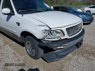 2001 Ford F-150 XL z VIN 1FTRX17L61NB26764, wystawiony jako IAAI lot #42049452 z przebiegiem 242 585 mil mil oraz . Historia ofert i sprzedaży dostępna na DreamBid. Obrazek 6.