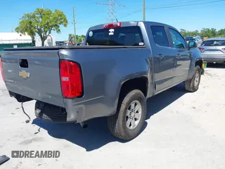 2020 Chevrolet Colorado 2WD Work Truck z VIN 1GCGSBEN5L1119170, wystawiony jako IAAI lot #41865912 z przebiegiem 99 896 mil mil oraz . Historia ofert i sprzedaży dostępna na DreamBid. Obrazek 4.