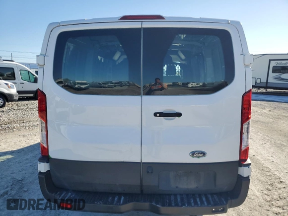 2019 Ford Transit with VIN 1FTYE1ZM6KKA48402, listed as a Copart auction lot 86892884 with 118,636 mi miles and Salvage title. Bid and sale history available at DreamBid. Image 6.