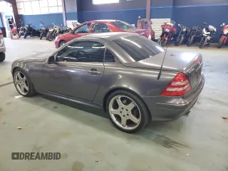 2003 Mercedes-Benz SLK 320 with VIN WDBKK65F83F280656, listed as a Copart auction lot 79158954 with 99,413 mi miles and Salvage title. Bid and sale history available at DreamBid. Image 2.