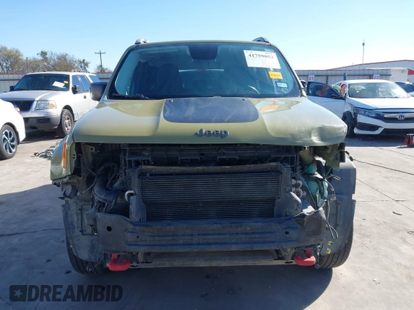2015 Jeep Renegade Trailhawk with VIN ZACCJBCT6FPC11721, listed as a IAAI auction lot 41759053 with 95,499 mi miles and . Bid and sale history available at DreamBid. Image 13.