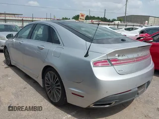 2014 Lincoln MKZ with VIN 3LN6L2GK4ER814286, listed as a IAAI auction lot 42657654 with 135,708 mi miles and . Bid and sale history available at DreamBid. Image 3.