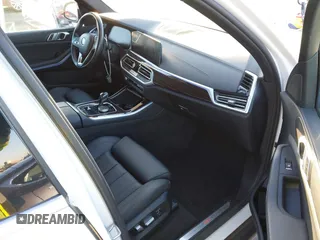 2021 BMW X5 sDrive40i with VIN 5UXCR4C03M9G59554, listed as a IAAI auction lot 41358056 with 47,577 mi miles. Bid and sale history available at carsss.com. Image 5.