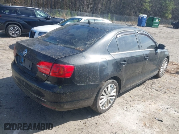 2013 Volkswagen Jetta TDI w/Premium/Nav with VIN 3VWLL7AJ8DM285616, listed as a IAAI auction lot 41597180 with 197,150 mi miles and . Bid and sale history available at DreamBid. Image 4.