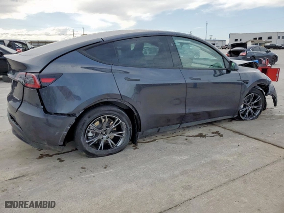 2024 Tesla Model Y Long Range with VIN 7SAYGDEE8RA304900, listed as a Copart auction lot 48895085 with 14,766 mi miles and Salvage Title. Bid and sale history available at carsss.com. Image 3.
