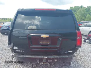 2015 Chevrolet Tahoe LTZ z VIN 1GNSCCKC8FR121461, wystawiony jako IAAI lot #42407901 z przebiegiem 137 729 mil mil oraz . Historia ofert i sprzedaży dostępna na DreamBid. Obrazek 17.