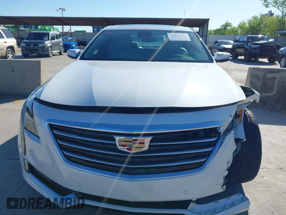2018 Cadillac CT6 Luxury AWD z VIN 1G6KD5RS9JU151575, wystawiony jako IAAI lot #42078361 z przebiegiem 28 187 mil mil oraz . Historia ofert i sprzedaży dostępna na DreamBid. Obrazek 19.