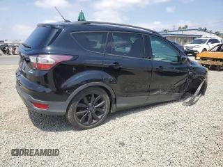 2017 Ford Escape SE z VIN 1FMCU0G92HUD20328, wystawiony jako Copart lot #55181485 z przebiegiem Nie podano mil oraz Szkoda całkowita • Salvage title. Historia ofert i sprzedaży dostępna na DreamBid. Obrazek 3.