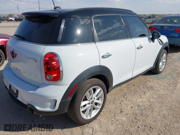 2014 MINI Countryman S z VIN WMWZC3C57EWP51864, wystawiony jako IAAI lot #42556774 z przebiegiem 73 912 mil mil oraz . Historia ofert i sprzedaży dostępna na DreamBid. Obrazek 4.